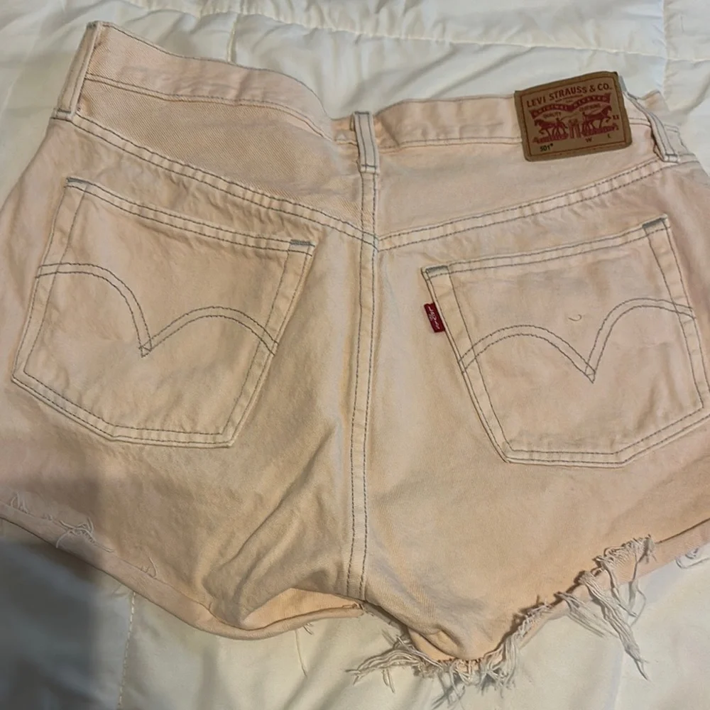 Women's Levi’s light pink Distressed Denim Shorts